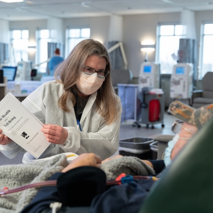 Nurse working with patient